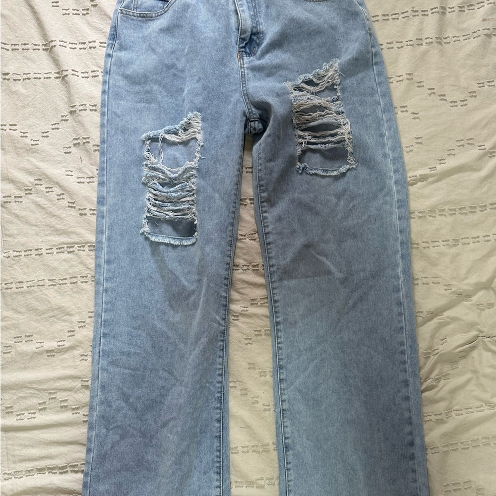 Distressed Light Blue Jeans